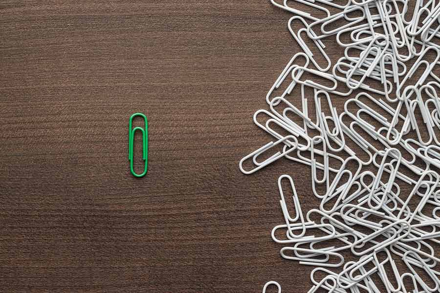 Bright green paper clip concept