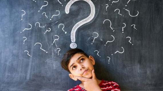 Doubts And Question Marks With Child Thinking At School