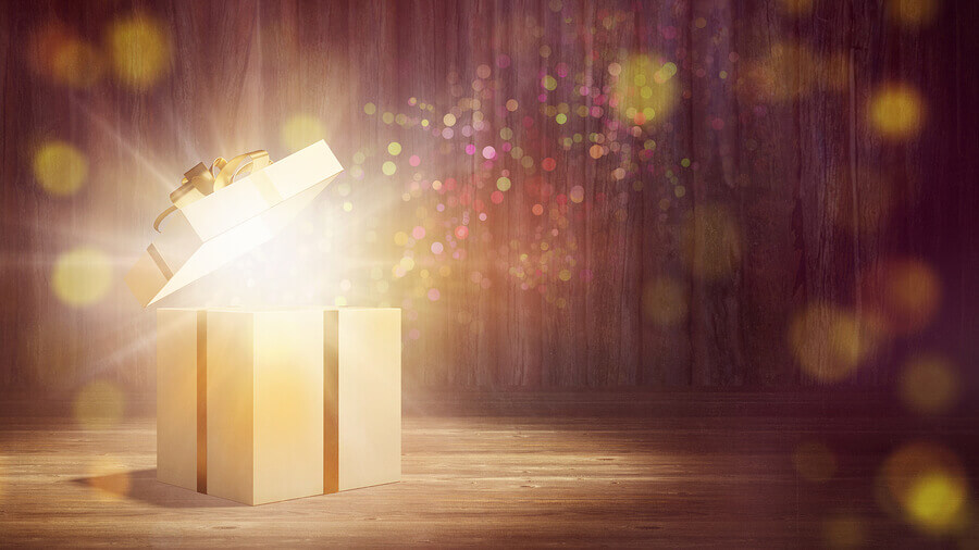 Glowing gift or present with beam light