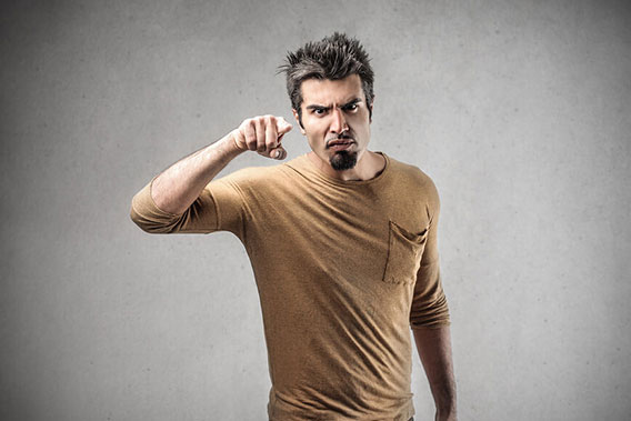 bigstock-angry-man-pointing-his-finger-518853